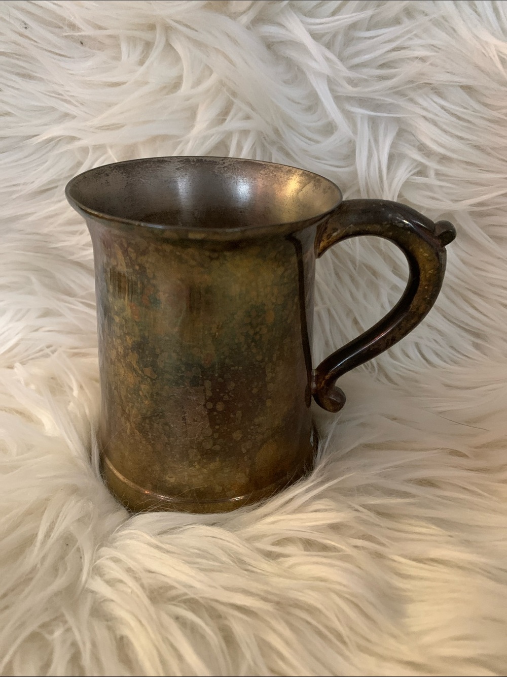 Solid brass mug, ~12 oz / 1.5 cup capacity 
Gatco is maker
Approximately 5” x 3”